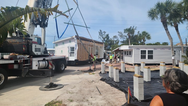 Installing new home at 413 Dije St.<br> Photos by Dan Mclean - Slide 8 width=